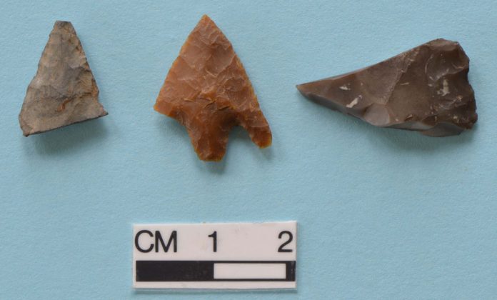 Tip of bifacial arrowhead; barbed-and-tanged arrowhead; fragment of bifacial implement (arrowhead or knife) in Yorkshire flint. © GUARD Archaeology Ltd
