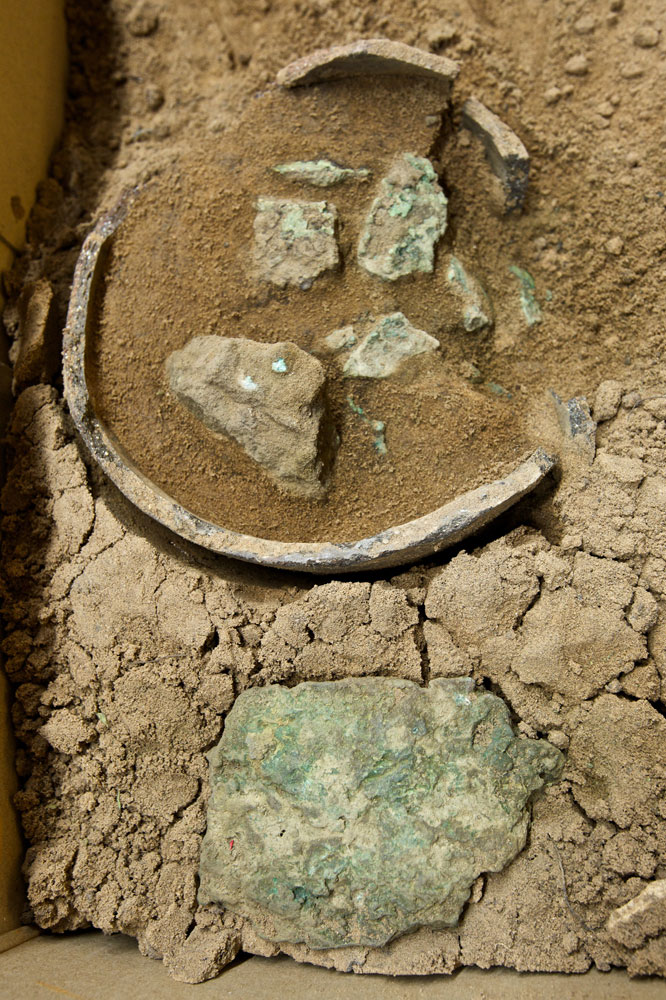 Smelters hoard in situ. Image: Surrey County Archaeological Unit (SCAU)