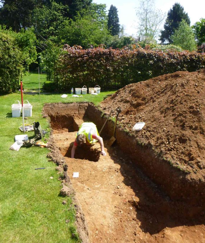 trench being hand-excavated by Trust excavator Alec