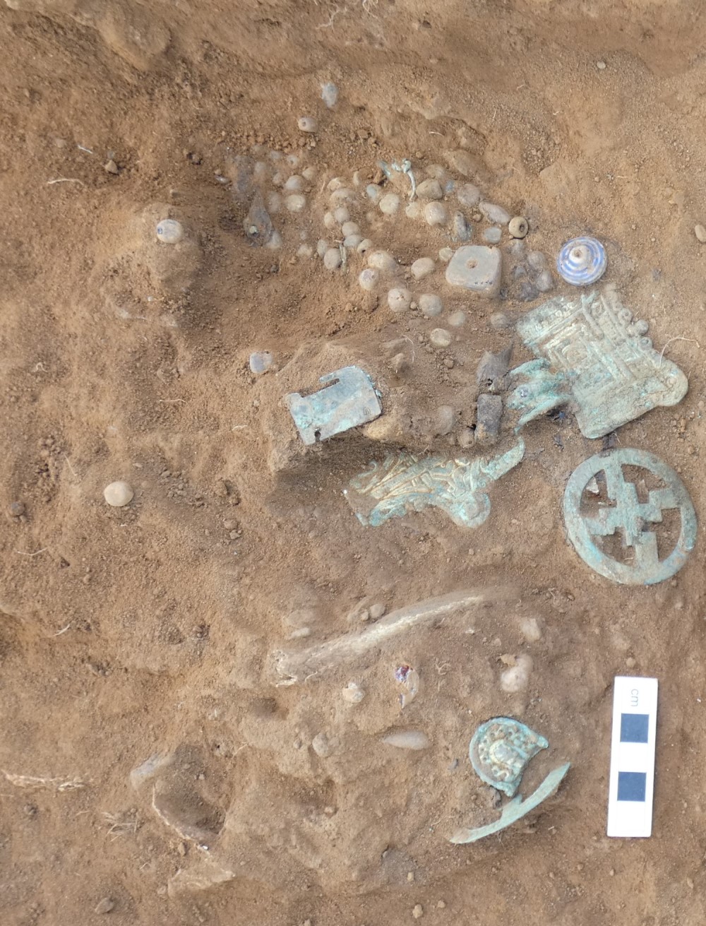 Collection of beads and brooches from Burial 1
