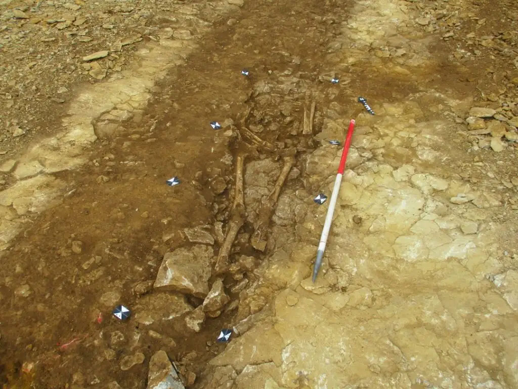 One of two Roman burials at Howes Lane found around the enclosure edges. The graves were shallow and others may have been lost to the plough.  Image: Cotswold Archaeology