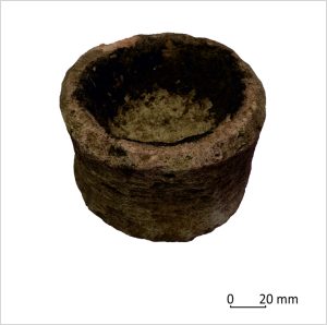 Caption: Cresset lamp with burnt residue (Urban Archaeology)